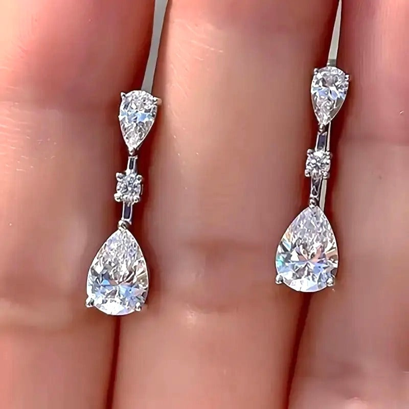 Elegant Silver Drop Earrings With Tear-Shaped Cubic Zirconia & Round Accents