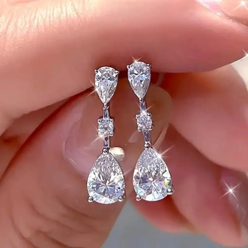 Elegant Silver Drop Earrings With Tear-Shaped Cubic Zirconia & Round Accents