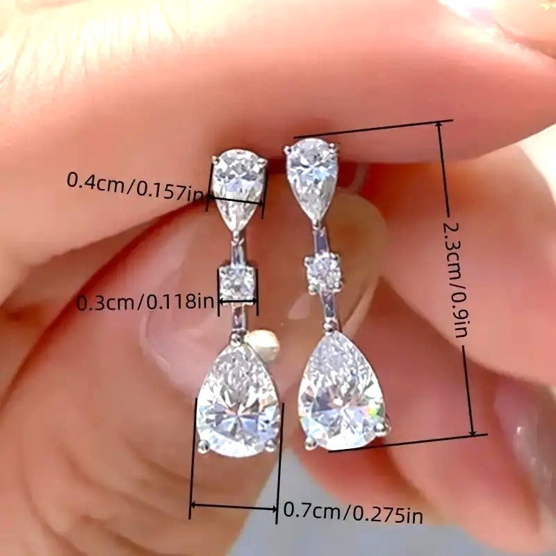 Elegant Silver Drop Earrings With Tear-Shaped Cubic Zirconia & Round Accents